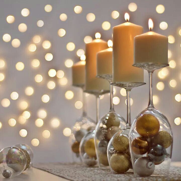 New Year's eve party decorations with wine glasses and candles